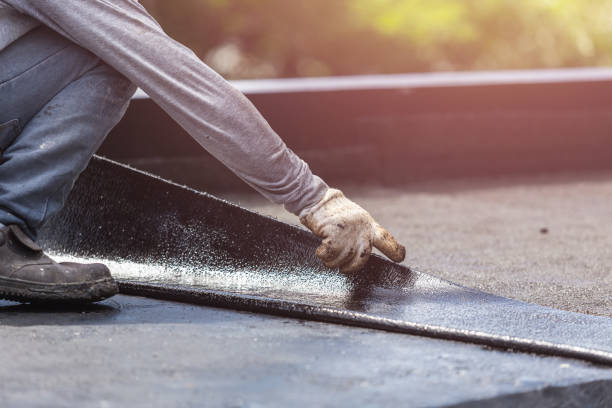Professional Basement Waterproofing technician working in Lewistown, PA